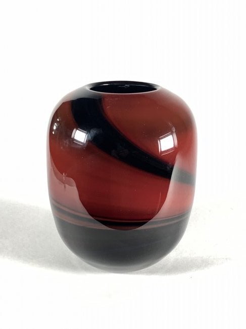 Labino Studio Art Glass Vase: Dominic Labino Art Glass Vase, ovoid form in opaque brownish red glass with a cobalt blue trailed design, signed Baker Labino Studio 8-1988. 6 in. h. x 5 in. w. Condition: Vey good with no damage or r
