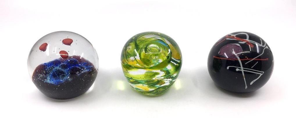 Peter Holmes Glass Paperweight and Two Others: Peter Holmes Glass Paperweight and Two Others, the Peter Holmes (Scottish, 20thc.) weight signed and titled, Uranus, dated 1971, Caithness, with a green weight signed JRR,2003 and another signed The G