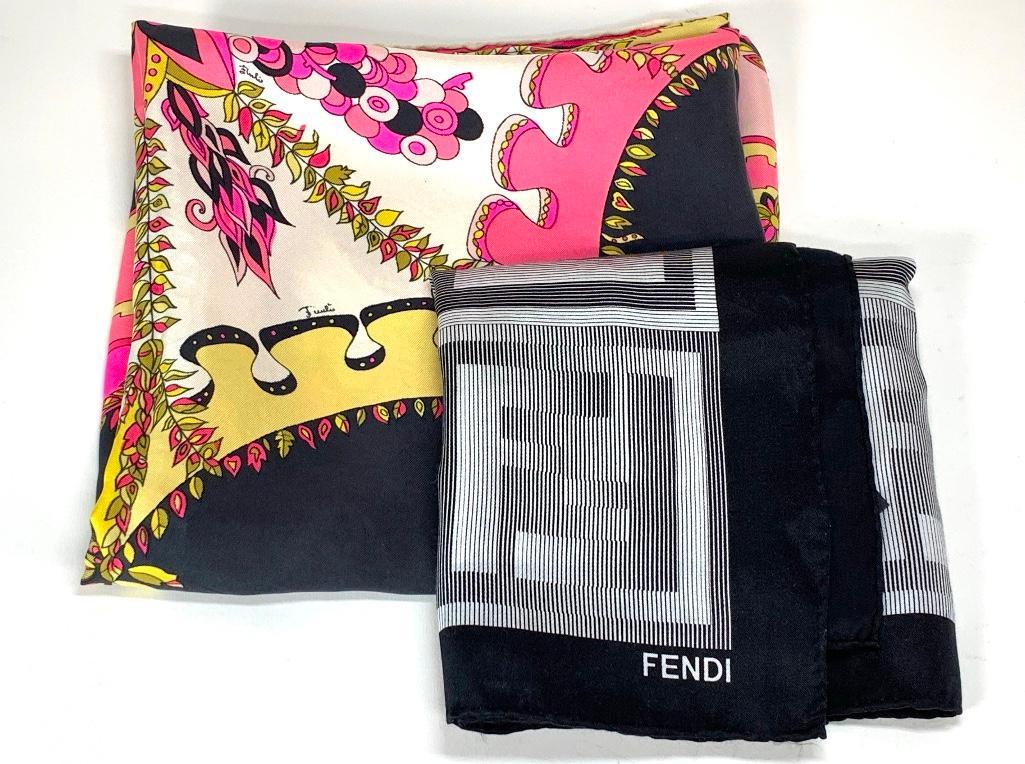 Two Silk Scarves, Pucci, Fendi: Two Silk Scarves, Pucci, Fendi, the Pucci scarf with a center medallion in pink, olive, black and yellow with a geometric border, signed Emilio in various locations, with hand rolled edge, the Fendi s