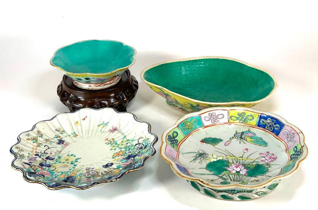 Four Asian Porcelain Footed Dishes and Teak Stand: Four Asian Porcelain Footed Dishes, three Chinese and one Japanese Karancha, together with a carved teak vase stand. 10 x 8 in.largest Condition: Smallest dish with rim chip, others normal wear.