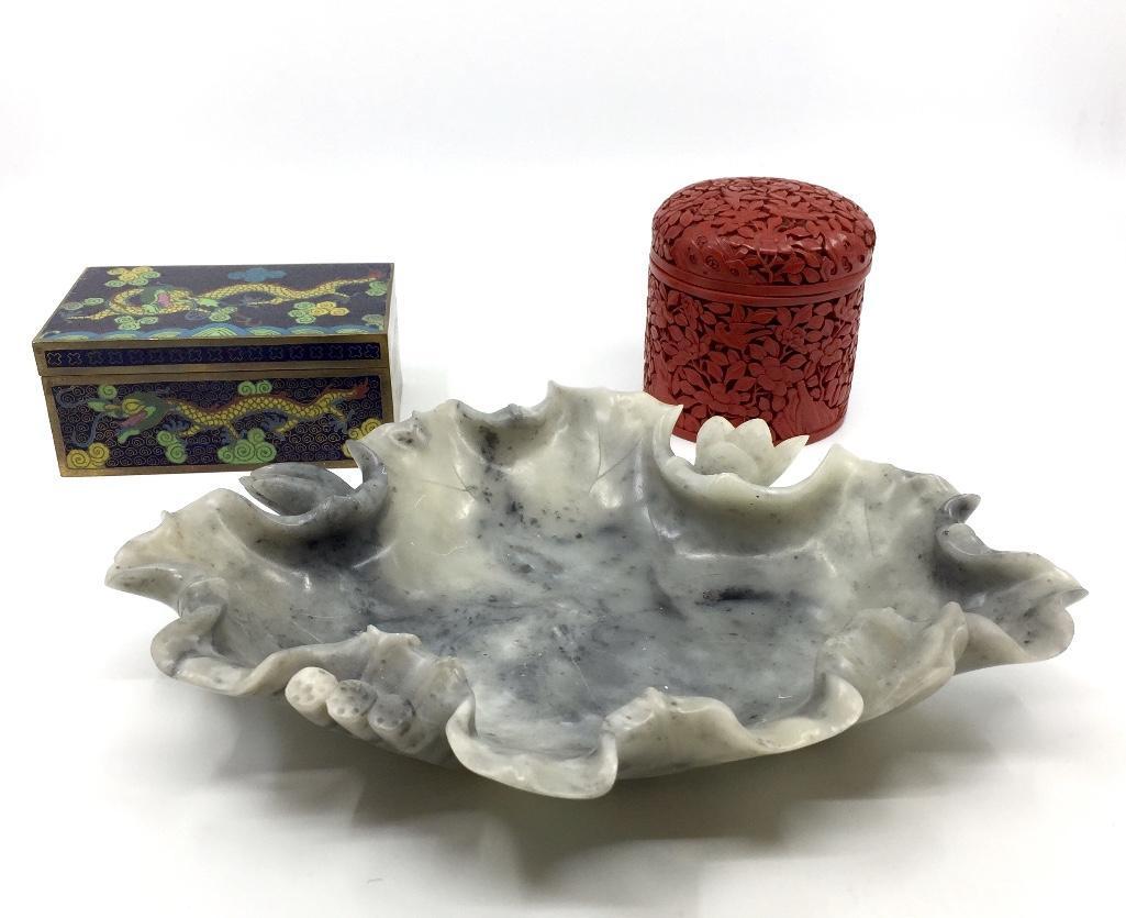 Assorted Chinese Lot: Assorted Chinese Lot, including a cinnabar lacquer tea caddy, a cloisonne box decorated with a dragon and a carved soapstone dish in the form of a leaf. 10 x 8 in. soapstone Condition: Good with norma