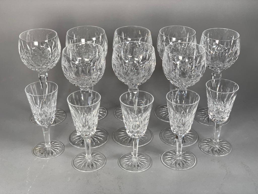 Waterford Crystal Group: Waterford Crystal group, Lismore pattern, comprising 8 Wine Hock glasses and 5 Sherry glasses. Dimensions: 7.5 in. H. wines, 5.25 in.h. sherries. Condition: One wine hock rim ground slightly, one sher