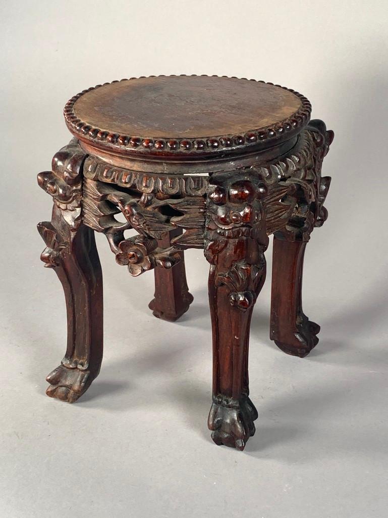 Miniature Chinese Carved Wood Tabouret, late 19thc.: Miniature Chinese Carved Wood Tabouret, late 19thc. Circular beaded top over a carved frieze, raised on cabriole legs carved with lion masks. Dimensions: 9 in.h. x 7 in. Dia. Condition: Wear to finish