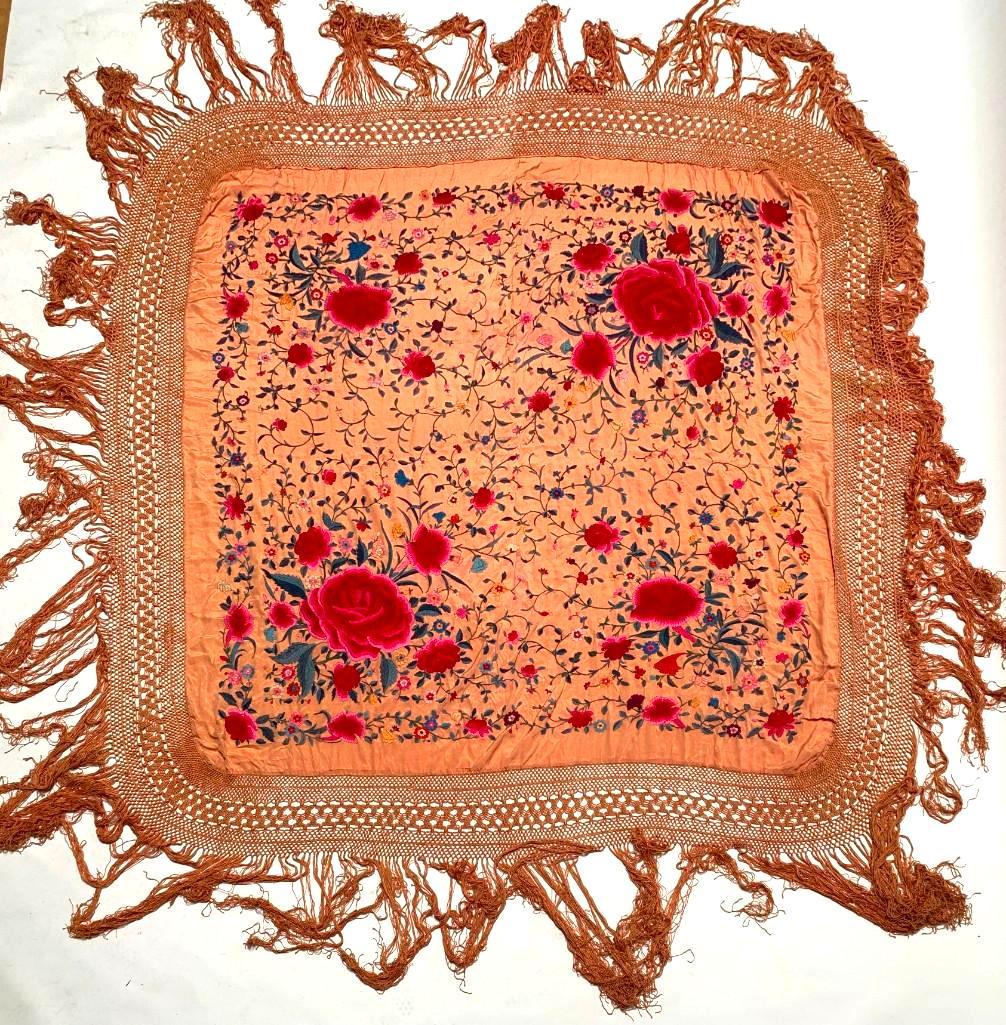 Chinese Vintage Silk Embroidered Piano Shawl: Chinese Vintage Silk Embroidered Piano Shawl, pale orange in color embroidered with vibrant pink peonies and colorful foliate scroll. Dimensions: 60 x 63 in. not including fringe. Condition: some wear