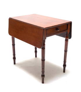 American Cherry Drop Leaf Table, 19thc.: American Cherry Drop Leaf Table, 19thc, rectangular top with a pair of drop leaves, with a single frieze drawer, raised on turned legs. Dimensions: 29 x 30.5 x 19 in. Condition: Wear, chips, stains