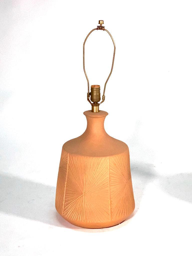 David Cressey Stoneware Table Lamp: David Cressey (American, CA, b.1916) Stoneware Table Lamp, wide tapering form in bisque terracotta incised with star patterns. Dimensions: 15 in.h. (to top of stoneware) x 11 in.w. Condition: Very goo