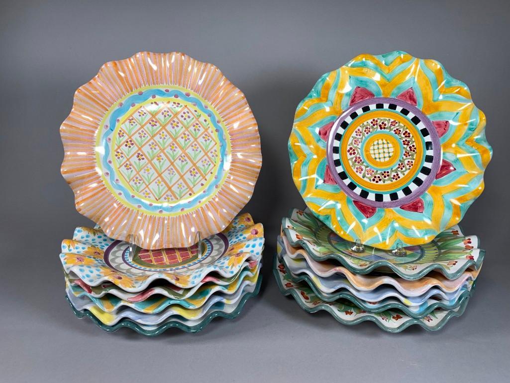 Twelve Mackenzie Childs Dinner Plates: Twelve Mackenzie Childs Dinner Plates, in assorted pattern , with ruffle edges. Dimensions: 11 in. dia. Condition: Very good with no damage or repair