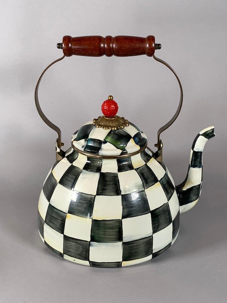 Mackenzie Childs Large Courtly Check Enamel Teapot: Mackenzie Childs Large Courtly Check Enamel Teapot, with bail hand;e and cinnabar finial. Dimensions: 9.5 in.h to top of finial, 8 in. dia. Condition: Small enamel wear to cover. Finial loose.