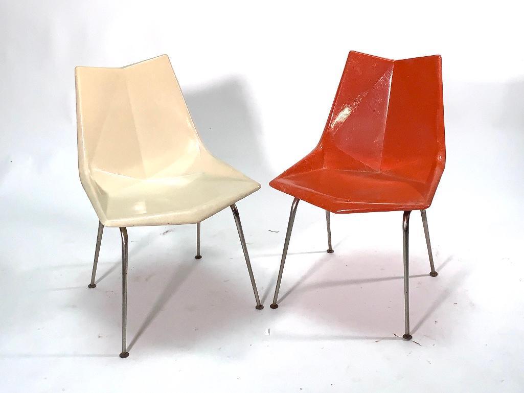 Two Paul McCobb Origami Side Chairs: Two Paul McCobb Origami Side Chairs, molded fiberglass on tubular chrome legs, one in orange and one in chalky white, for St. John Seating. With original labels, Dimensions: 31 x 21 x 16 Condition: Ox