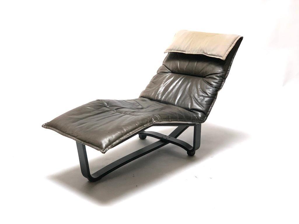 Another Mid-Century Modern Chaise Lounger by Ingmar &: Ca. 1970. Made in Norway, black bentwood wood frame, stretched black taught nylon with leather reversible cushion. It tilts between two positions, from a sitting to fully reclined. The chaise cushion