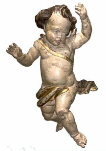 German or Italian Baroque Carved Polychromed Cherub: German or Italian Baroque Carved and Polychromed figure of a Cherub in flight, fully carved in the round, with full cheeks and languid eyes, with gilded wings, rotund body draped with a cloth. 