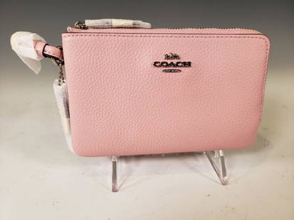 Coach Pebble Leather Double Corner Zip Wristlet, Blush: Coach® Pebble Leather Double Corner Zip Wristlet. Blush Leather. Palladium Hardware. Model Number F87590. Dimensions: 4.25 x 6 in. Condition: New and unused in wraps. NEUE Auctions