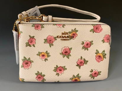 Coach Flower Patch Small Wristlet NWT: Coach® Flower Patch Small Wristlet Chalk. Printed Coated Chalk Canvas; Palladium Hardware. Model Number: 12050. Suggested Retail $65.00 Dimensions: 4 x 6 in. Condition: New and unused with tags. NEUE