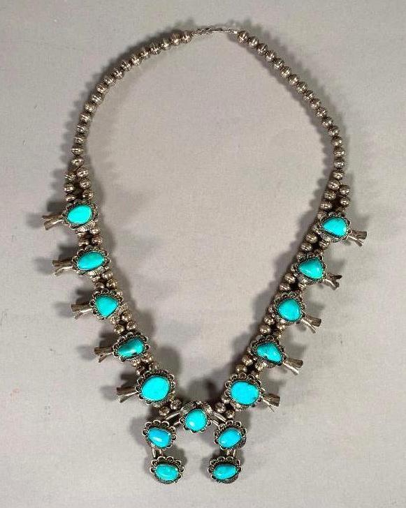 Silver and Turquoise Cripple Creek Mine Squash Blossom: Silver and Turquoise Cripple Creek Mine Squash Blossom Necklace, Signed with Maker's initials RP, double strand lozenge bead form with 10 turquoise inset squash blossoms centering the naga with 5 turq