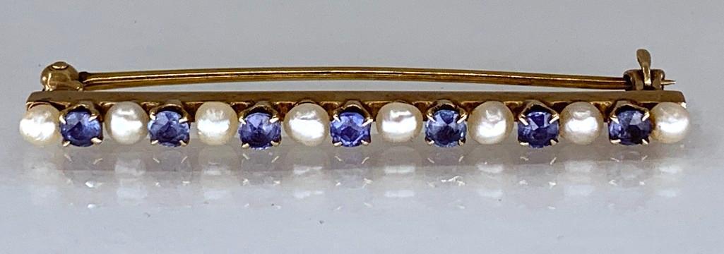 14K Yellow Gold, Sapphire and Pearl Bar Pin: 14K Yellow Gold, Sapphire and Pearl Bar Pin, 7 round cut sapphires and 8 pearls. Weight: 3.72 g. Dimensions: 1.75 in.l. Condition: Normal age appropriate wear.