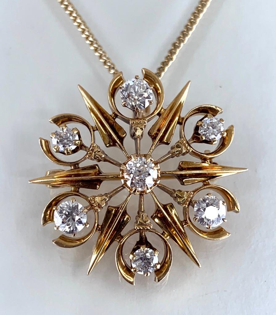 Antique Gold and Diamond Starburst Pendent/Brooch, ca.: Unmarked yellow gold starburst pendent with bale and bar pin, prong set with seven old European cut bright white diamonds, aprx 1.5 carats TDW, aprx 10 grams, aprx 1"D. With 9"L unmarked gold toned ch