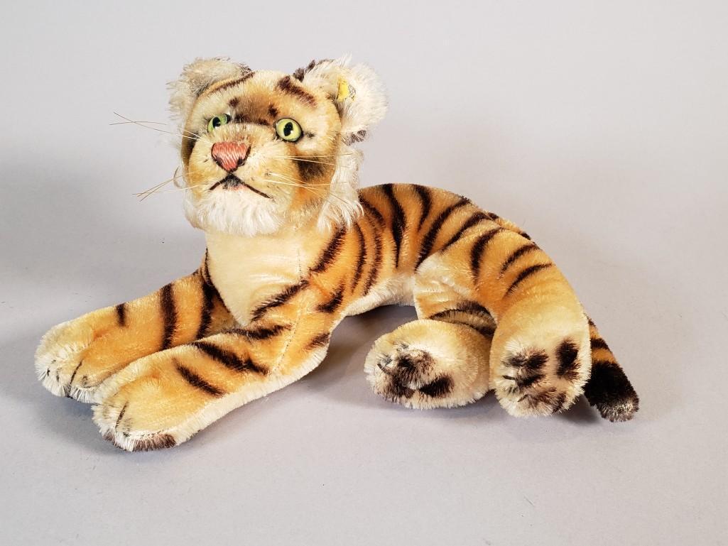 Steiff Mohair Tiger: Steiff Mohair Tiger, button in ear. Dimensions: 10 in.l. Condition: Very good, with light wear.