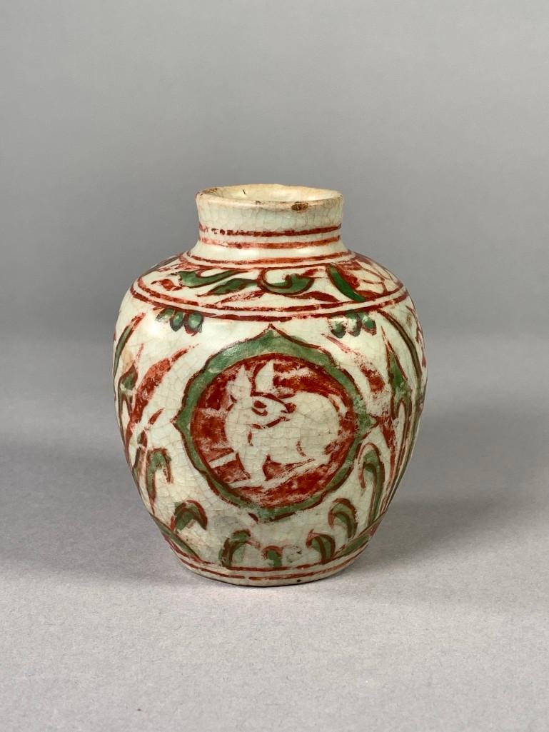 Chinese Swatow Jarlet, Ming Dynasty: Chinese Swatow Tea Caddy, Ming Dynasty, of baluster form, decorated with small deer in circular medallions in red and green glaze reserved on a floral and foliate ground. Dimensions: 3.75 in.h. 3 in. 