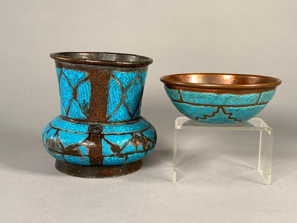 Two Syrian Enamel over Copper Vessels: Two Syrian Enamel over Copper Vessels, each enameled with scroll and calligraphic designs in turquoise. Dimensions: 5 in.h.(Vase) 4.75 in. dia. (bowl)