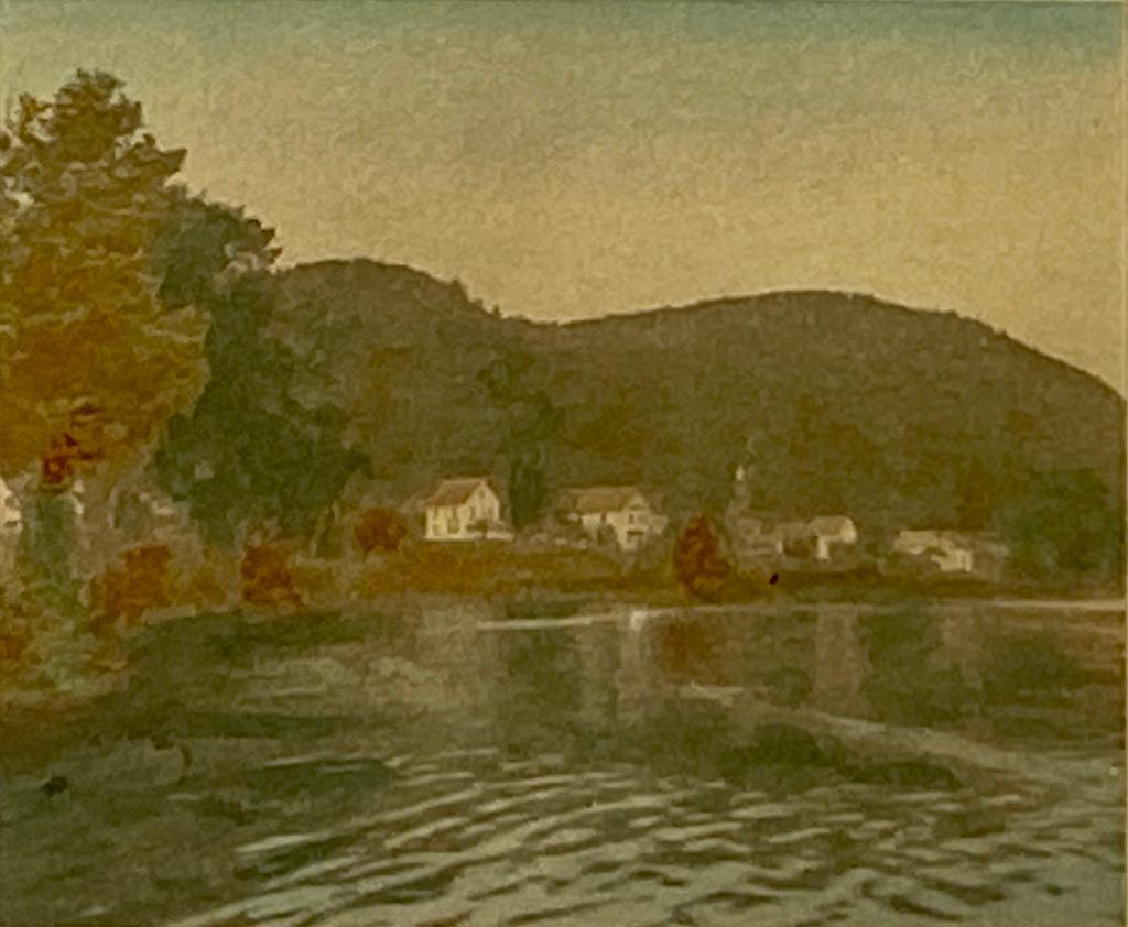 Wallace Nutting, "An Androscoggin Village": Wallace Nutting (American 1861-1941) "An Androscoggin Village," hand-colored photograph, signed in ink lower right, framed. Dimensions: 3 x 4 in. image size 7.75 x 9.75 in. as framed. Condition: As is