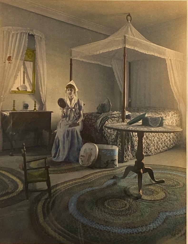 Wallace Nutting, "Justifiable Vanity": Wallace Nutting (American 1861-1941) "Justifiable Vanity," hand-colored photograph, signed in ink lower right, titled lower left, framed. Dimensions: 9.5 x 7.25 in. image size 19 x 15.75 in. as framed