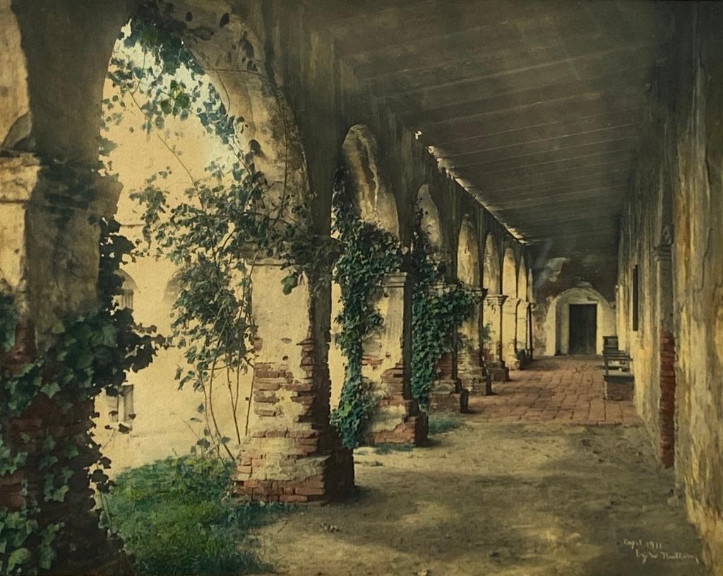 Wallace Nutting, "Ivy and Rose Cloisters": Wallace Nutting (American 1861-1941) "Ivy and Rose Cloisters," hand-colored photograph, signed in ink lower right, titled lower left, framed. Dimensions: 7.5 x 9.5 in. image size 15 x 17.75 in. as fra
