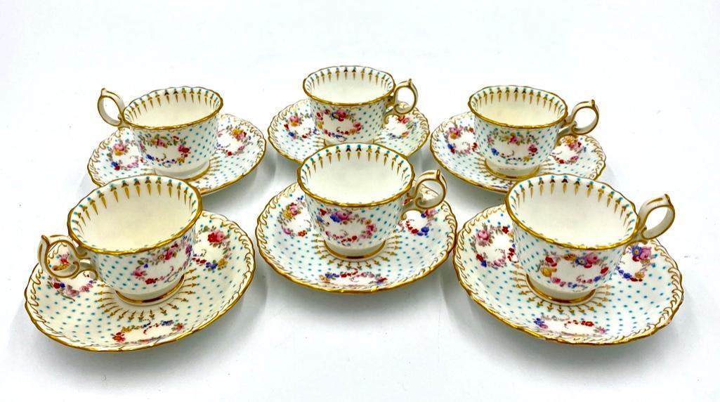 Minton's Demitasse Cups and Saucers: Minton's Demitasse Cups and Saucers, 6 cups and 6 saucers in pattern S7618, decorated with raised turquoise dots, floral sprigs and gilding. Dimensions: Saucers 4.5 in. dia. Cups, 2.5 in. dia. Con