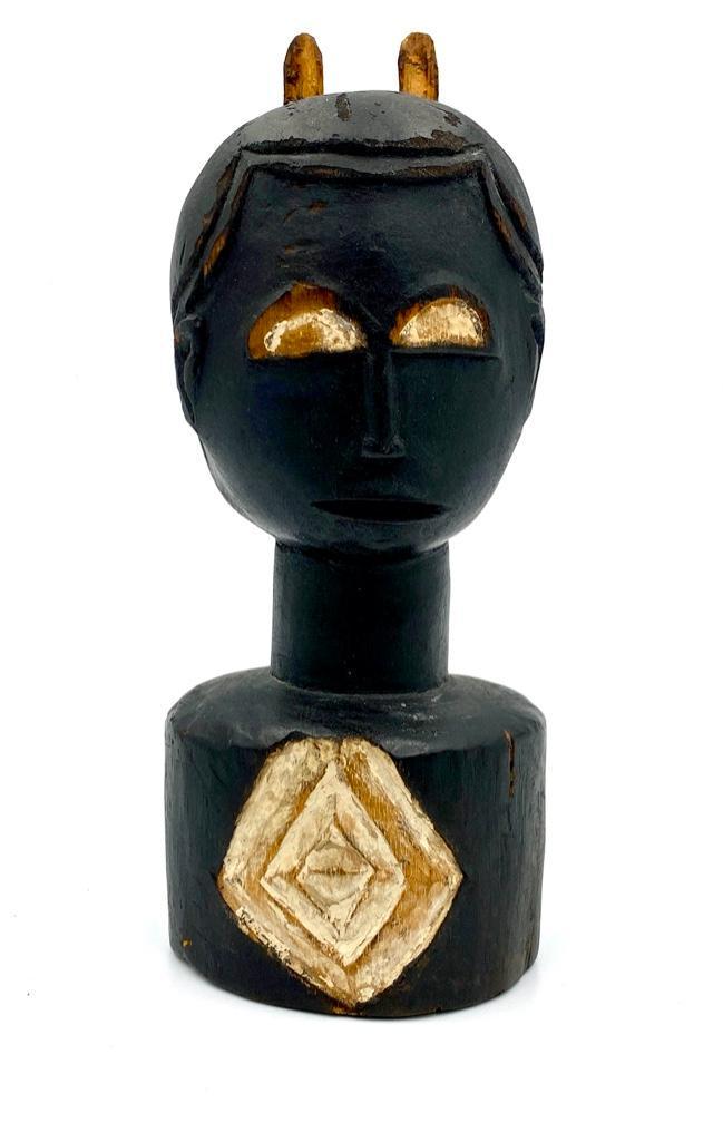 Ethnographic Carved and Painted Wood Bust: Ethnographic Carved and Painted Wood Bust, ebonized and pigmented form with carved base. Dimensions: 10 in. h. x 4 in. 3w. x 3 in.d. Condition: Some wear.