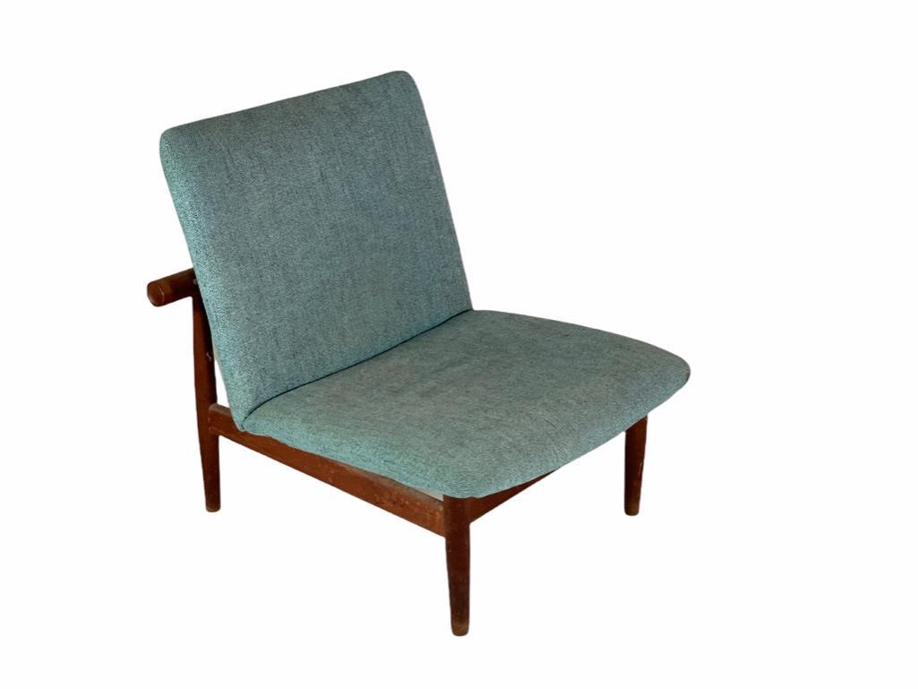 Finn Juhl Japan Series Upholstered Lounge Chair: Finn Juhl Japan Series Upholstered Teak wood Lounge Chair, 1957, designed by Finn Juhl for France and Son, Denmark, retailed by John Stuart, the teak frame with upholstered back and seat, on tapering