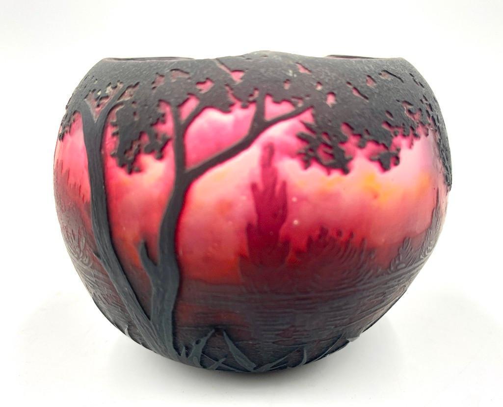 Daum Nancy Scenic Cameo Glass Rose Bowl: Daum Nancy Scenic Cameo Glass Rose Bowl, of spherical form with trefoil mouth, the gray glass walls mottled with orange and yellow, overlaid with deep blackish purple shading to rosy pink, cameo carve