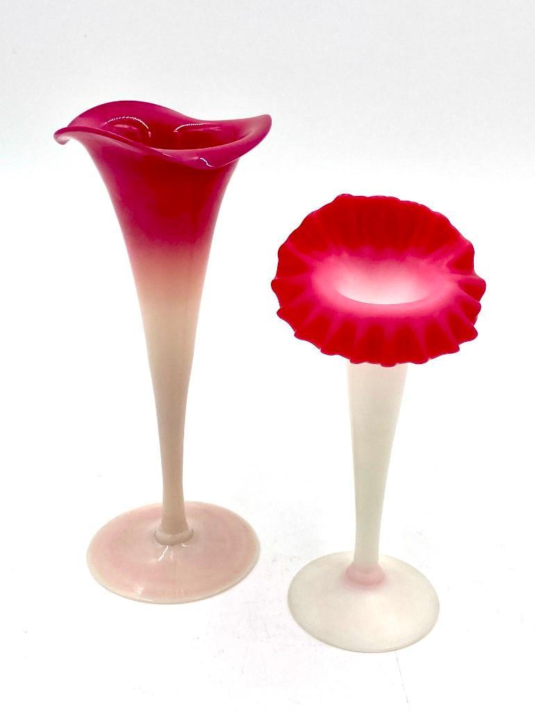 New England Peachblow Lily Vase: New England Peachblow Lily Vase, tapering form with undulating rim on circular foot, glossy finish, together with a satin finish peachblow trumpet vase with crimped rim. Dimensions: 8 in.h.; 7.25 in.h