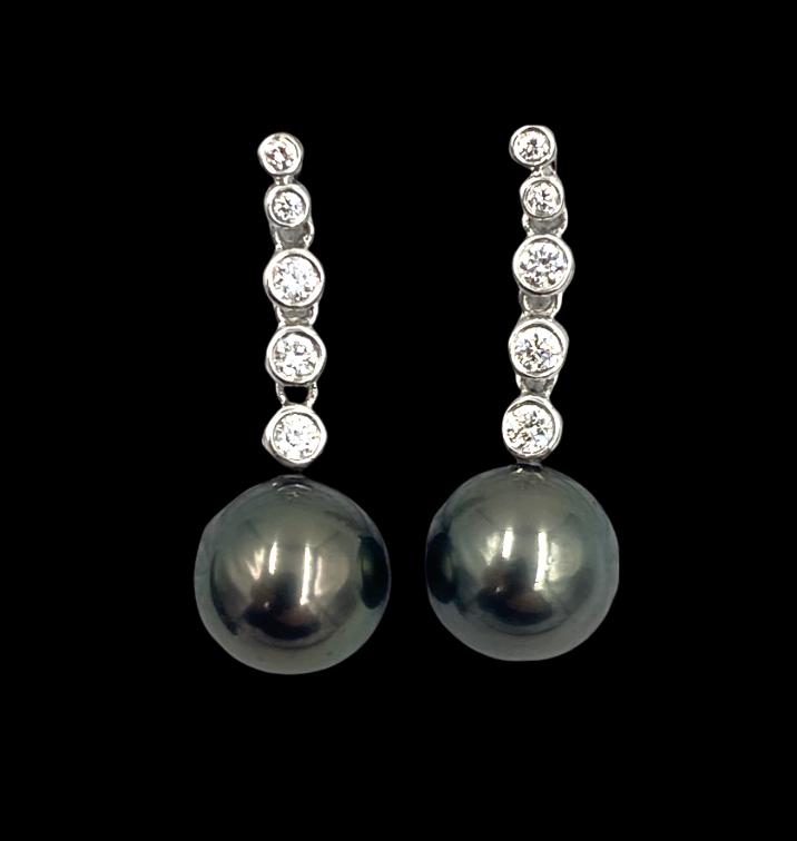 Perfect Gem Black Tahitian Pearl and Diamond Earrings: White gold with bezel set diamonds, apprx .35 cts. tdw., terminating to an apprx 9mm black Tahitian pearl, 1 in.l.