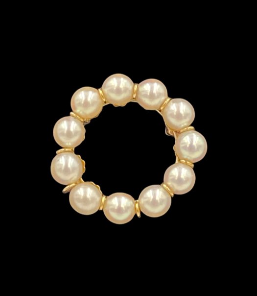 14K Gold and Pearl Brooch: 14K yellow gold frame set with eleven (11) round 6mm pearls, apprx 4.6 grams. Bar pin clasp.