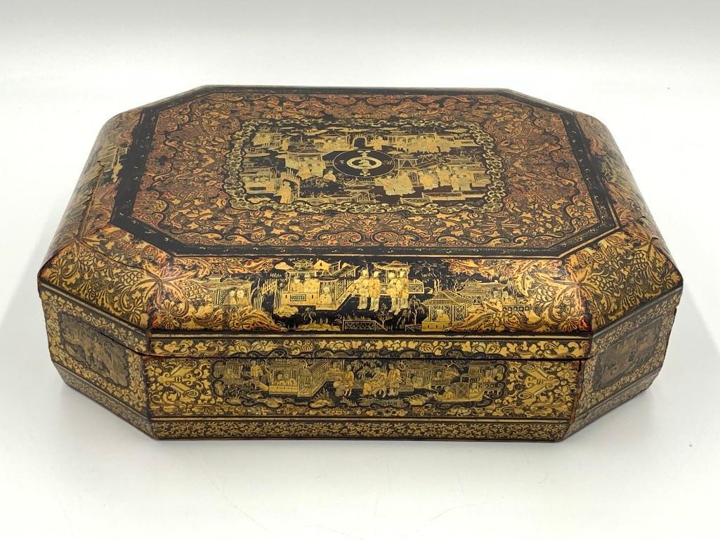 Chinese Export Lacquer Games Box, 19thc.: Chinese Export Lacquer Games Box, 19thc. Rectangular octagonal form intricately decorated with chinoiseries in gilt on black/brown lacquer centered by a coat of arms, the interior fitted with seven co