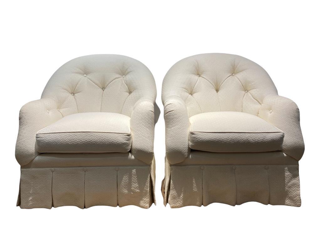 Pair of Century Furniture Upholstered Tub Chairs: Pair of Century Furniture Upholstered Tub Chairs, contemporary, with curved tufted backs and box pleated skirts in white basketweave textured fabric. Dimensions: 37 in.h. x 31 in.w. x 36 in.d. Conditi