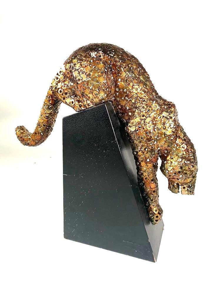 Welded Metal Figure of a Jaguar, Contemporary: Welded Metal Figure of a Jaguar, Contemporary, modeled as an openwork jaguar on a trapezoidal shaped plinth. Unsigned. Dimensions: 25 in.h. x 24 in.w. x 8 in. d. Condition: Some chips and wear to plin