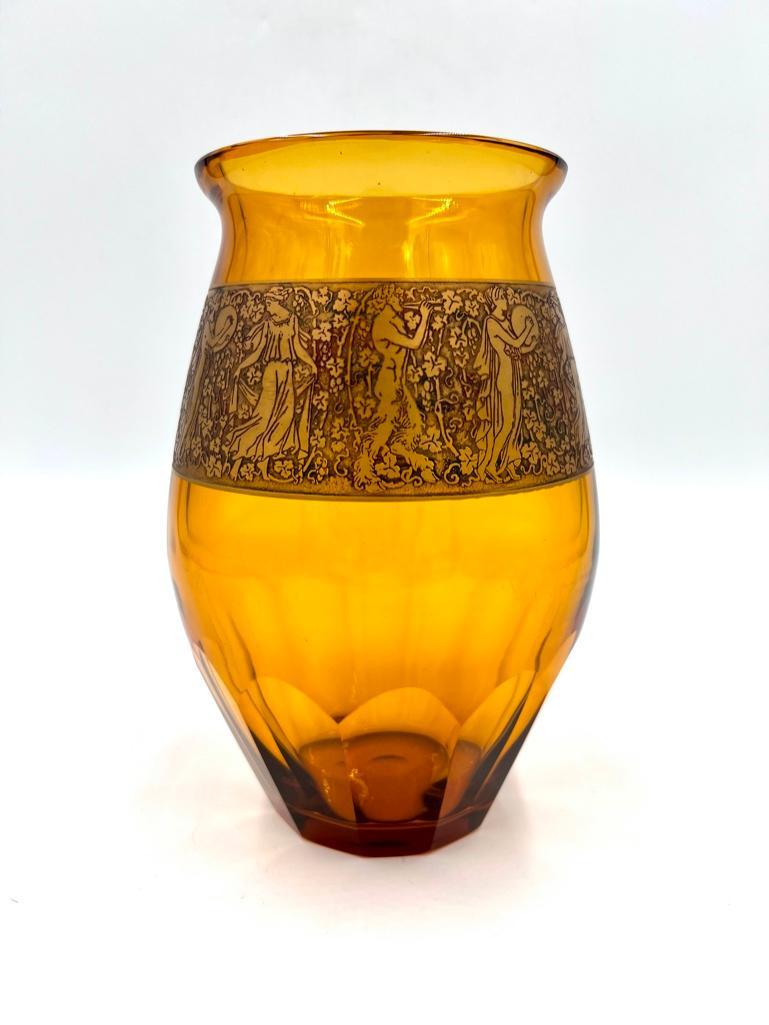 Moser Acid Etched Amber Vase: Moser Acid Etched Amber Vase, c.1930's, with faceted base and flared rim, in clear amber glass decorated with a banded border overlaid, cameo carved and gilded with a procession of classical figur