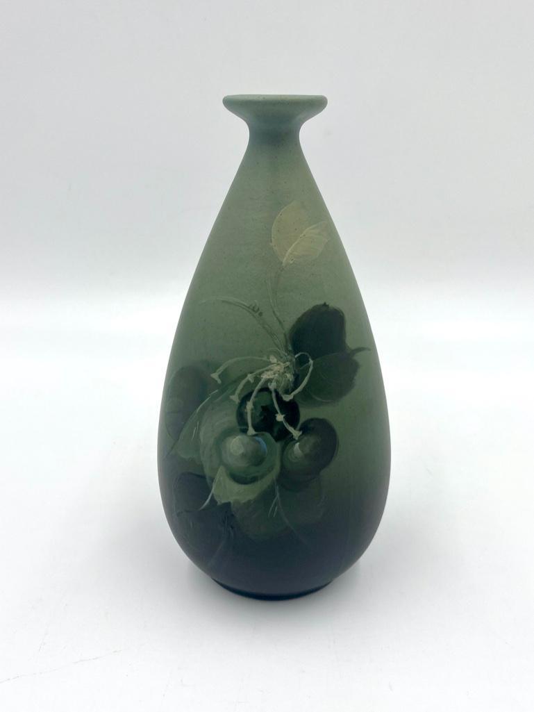 Weller Pottery Matte Glaze Vase: Weller Pottery Matte Glaze Vase, ovoid bottle form vase in matte glaze shading from pale green to charcoal gray decorated with cherries on leafy stems. Impressed Weller Louwelsa X 95 and with incised 