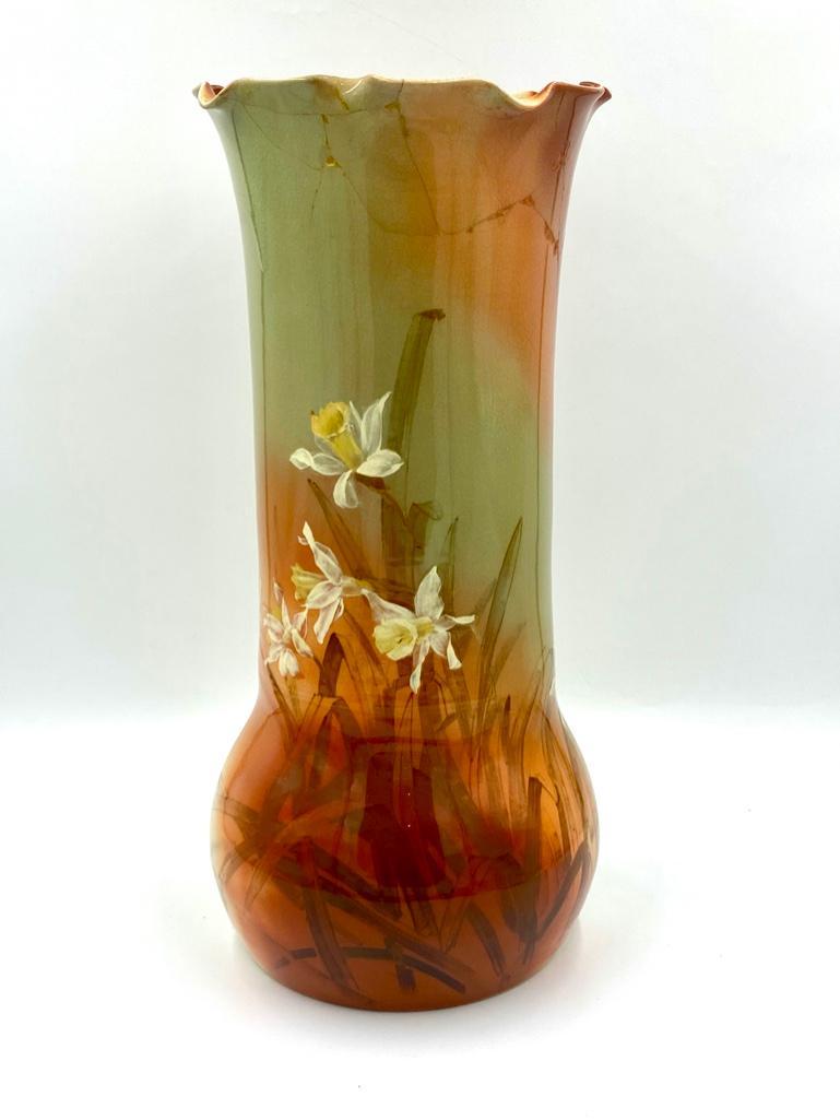Rookwood Pottery Umbrella Stand, 1900: Rookwood Pottery Umbrella Stand, 1900, bulbous base supporting cylindrical body and ruffled rim, in standard glaze decorated with daffodils and leaves. Impressed Rookwood mark 178 W. Dimensions: 24 in