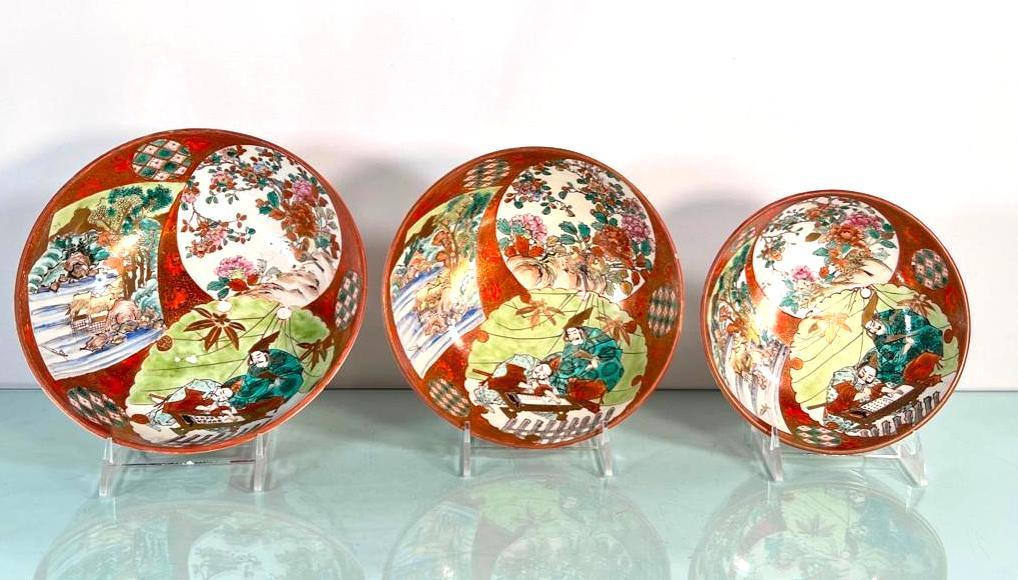 3 Antique Red Kutani Bowls, Ohara School Grandmaster: 3 Antique Red Kutani Bowls from the estate of Katsuko Fujikado-Lee, an Ohara (Ikebana) School Grandmaster who lived in Washington D.C. The graduated set probably dates to the Meiji Period. The Proceed