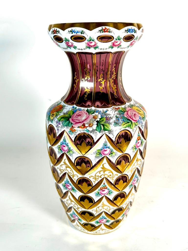 Czechoslovakian Overlaid and Hand Painted Glass Vase: Czechoslovakian Overlaid and Hand Painted Glass Vase, of baluster form overlaid with opaque white cut back to translucent amethyst, the exterior hand decorated with well painted colorful floral sprays