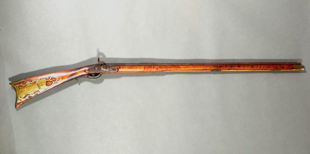 Percussion Full Stock Rifle: Kentucky style, full maple stock, appears to have been converted from Flint, made by J. M. Casewell, Lansingburgh (New York). Ornate brass work patch box with hidden button. Octagonal barrel, has wood