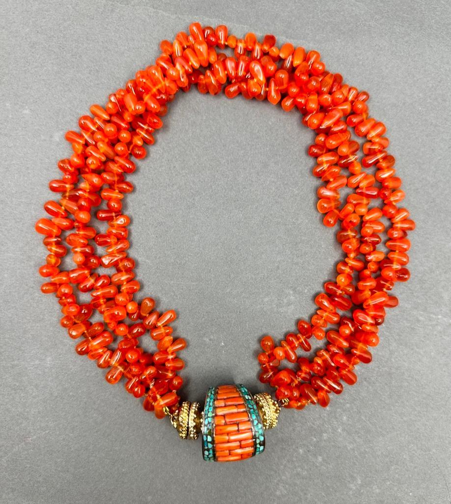 Clara Williams Carnelian Magnetic Necklace: Clara Williams Magnetic Necklace Multi-Strand carnelian with magnetic clasps, measures 17.5 inches end to end. Interchangeable turquoise and carnelian centerpiece measures approximately 2 inches with 