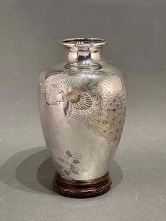 Japanese Silver Vase Decorated with Phoenix by Katsuyuki Koku: Japanese Silver Vase with Phoenix: Katsuyuki Koku (Meiji Period), probably created around 1910, is a fine example of Japanese silver artistry. A pair of phoenix (Ho-ho) fly over peony plants. The moti