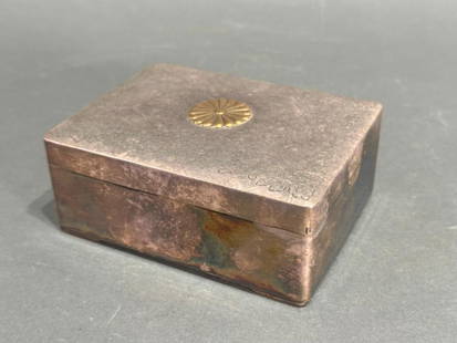 Japanese Silvered Box and Cover, Inaba, Meiji Period: Japanese Silvered Box and Cover, signed Inaba Kinsei (Humbly made by Inaba) Meiji Period, rectangular form with applied gilded stylized Imperial chrysanthemum to top, the corners engraved with a folia