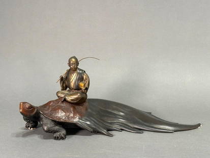 Japanese Bronze " Urashima Taro " by Oshima Joun: Oshima Joun (Japanese 1858-1940) "Urashima Taro", bronze with black, brown and gilded patination, signed to base. In Japanese folklore Urashima Taro was a fisherman who is rewarded for rescuin