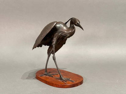 Japanese Bronze Figure of an Egret, Signed, Meiji Period: Japanese Bronze Figure of an Egret, Meiji Period, Signed, standing, in an animated pose as if stalking prey, bronze with warm brown patination, with gilded bronze inset eyes, affixed to wood base. Sig