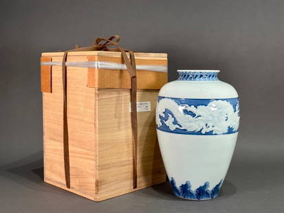 Japanese Blue and White Koransha Porcelain Vase, c.1935: Japanese Blue and White Koransha Porcelain Vase, c.1935, from the Koransha kiln, Arita. Of baluster form, decorated with a relief molded and incised band below the shoulder depicting a finely detailed