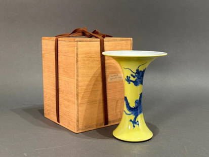 Japanese Porcelain Vase: Blue Dragon on Yellow Ground; Makuzu Kozan II: Japanese Porcelain Vase: Blue Dragon on Yellow Ground, is a work by Makuzu Kozan II (Japanese 1859-1940). The shape of the vase is inspired by ancient Chinese bronze Ku vessels. Finely created from po