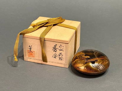 Japanese Lacquer Incense Container (Kogo) by Kaoru Machikawa: Japanese Lacquer Incense Container (Kogo) by Kaoru Machikawa, Contemporary, of circular lozenge form decorated with a mountain landscape and waterfall with old pines in takamaki-e and nashiji, the